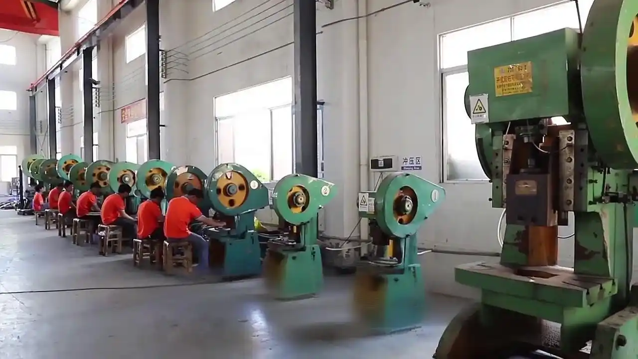 Automated stamping machine in BBQ tool production